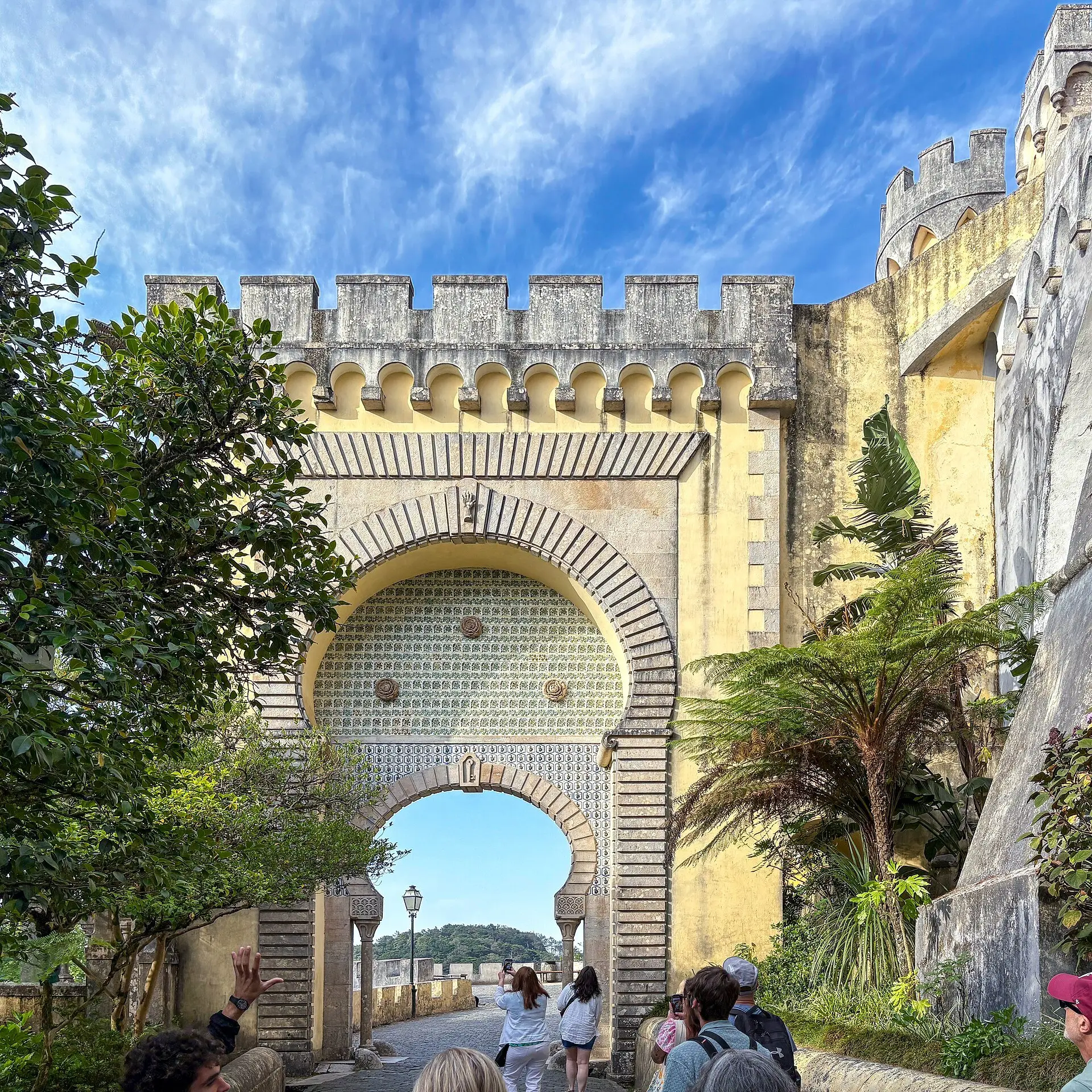 The horseshoe gateway with tiled arch at the entrance to the Pena Palace courtyard