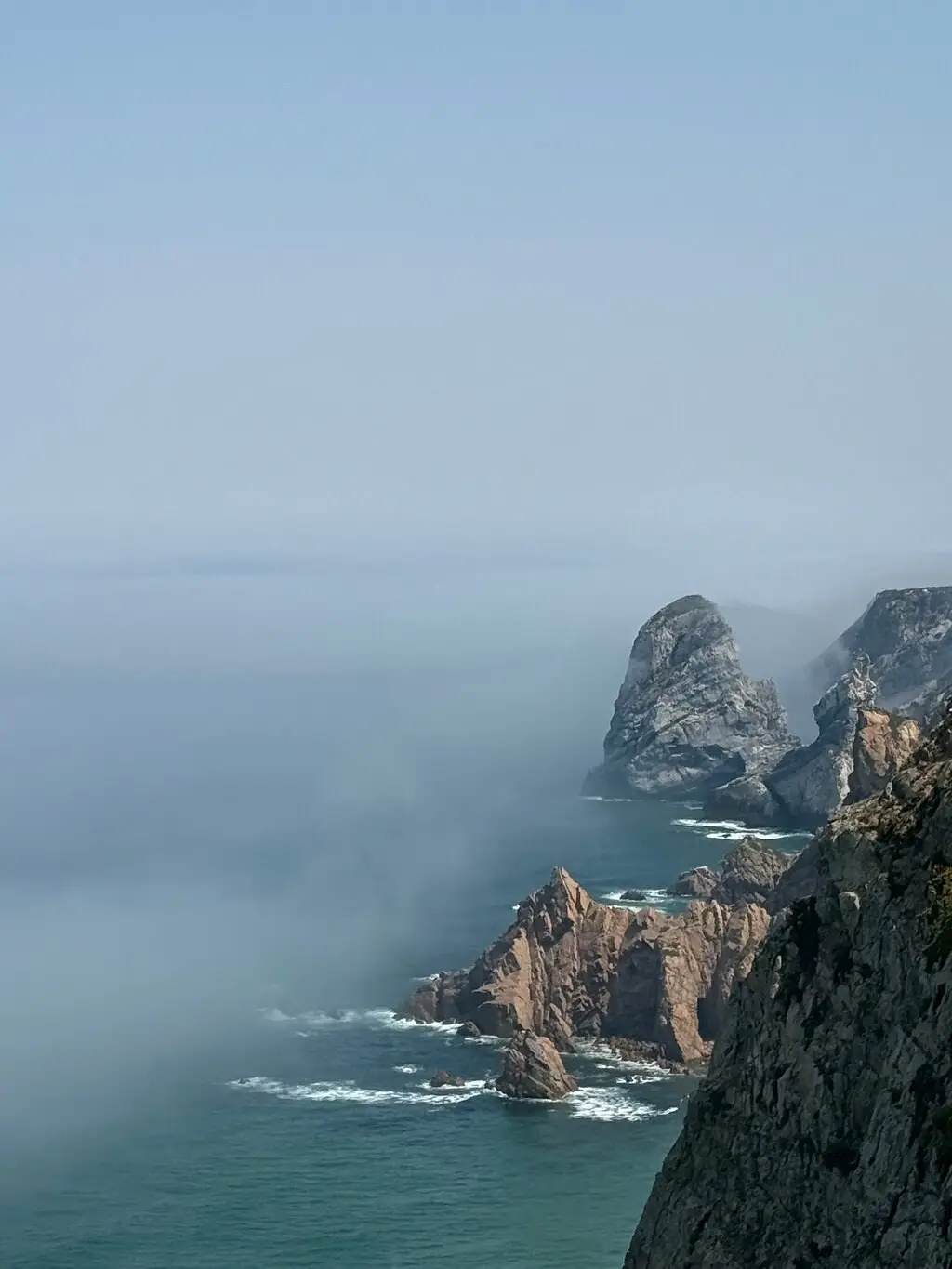 The cliffs of Cabo da Roca in sea fog