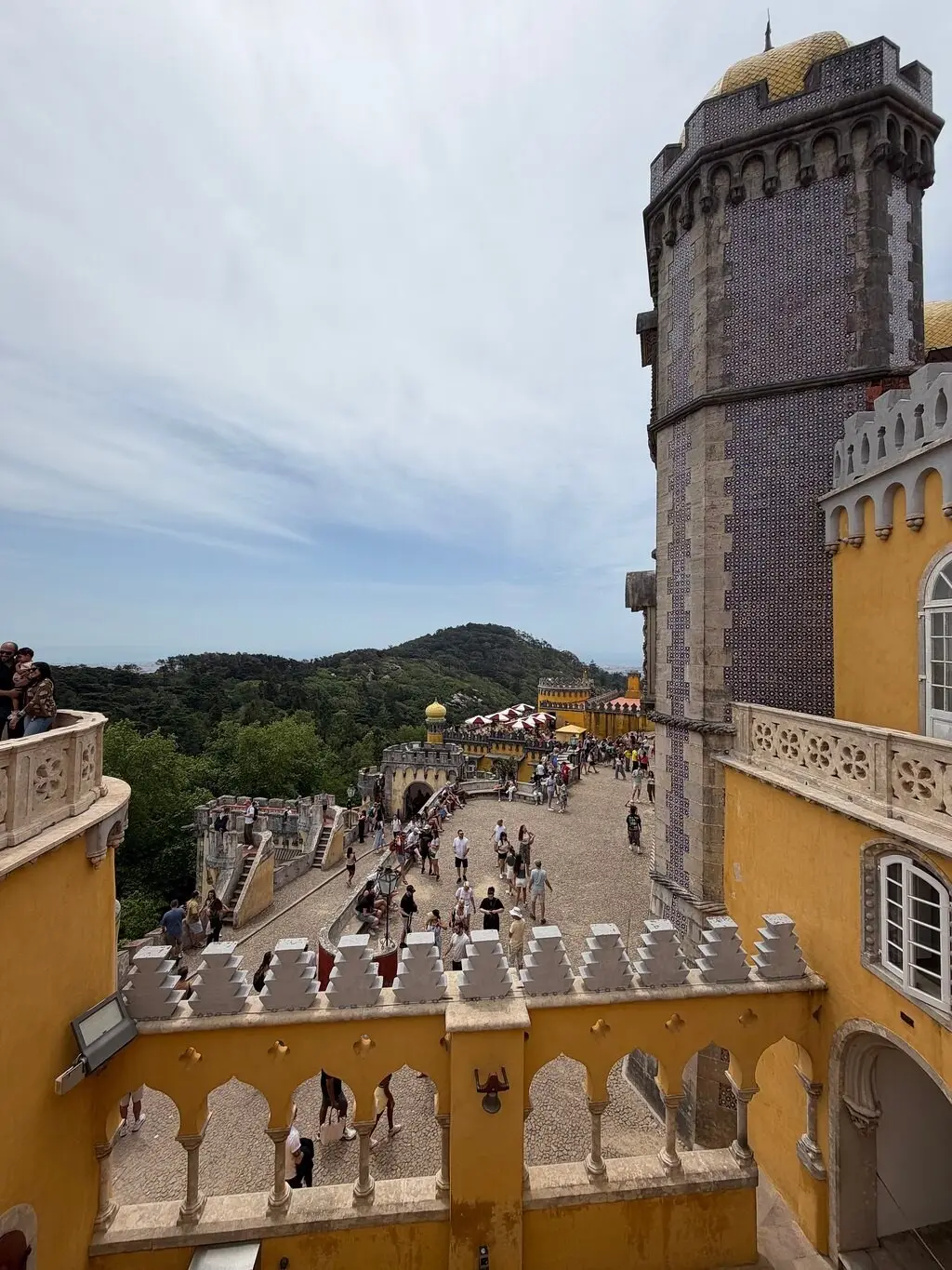 The main Pena terrace full of visitors, seen from a tower