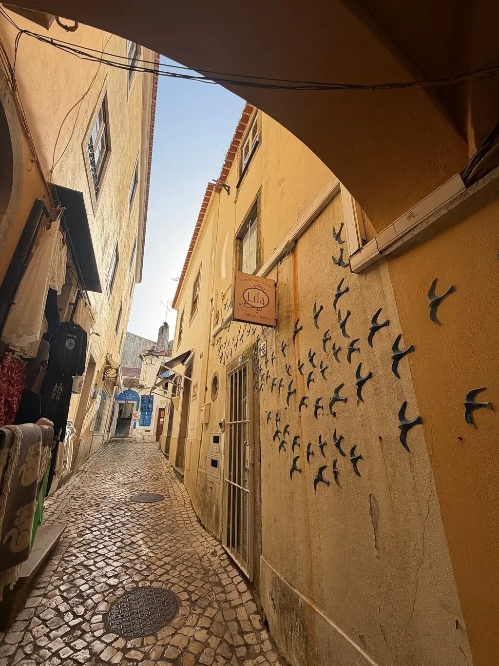 A narrow cobbled street in Sintra’s historic centre
